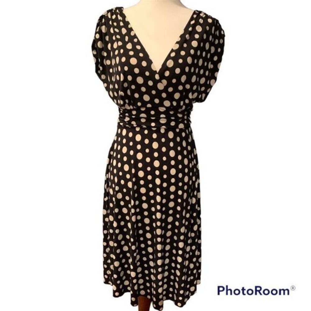 Polka-dot dress. Low cut open back pin up girl swing dress Flowy dress